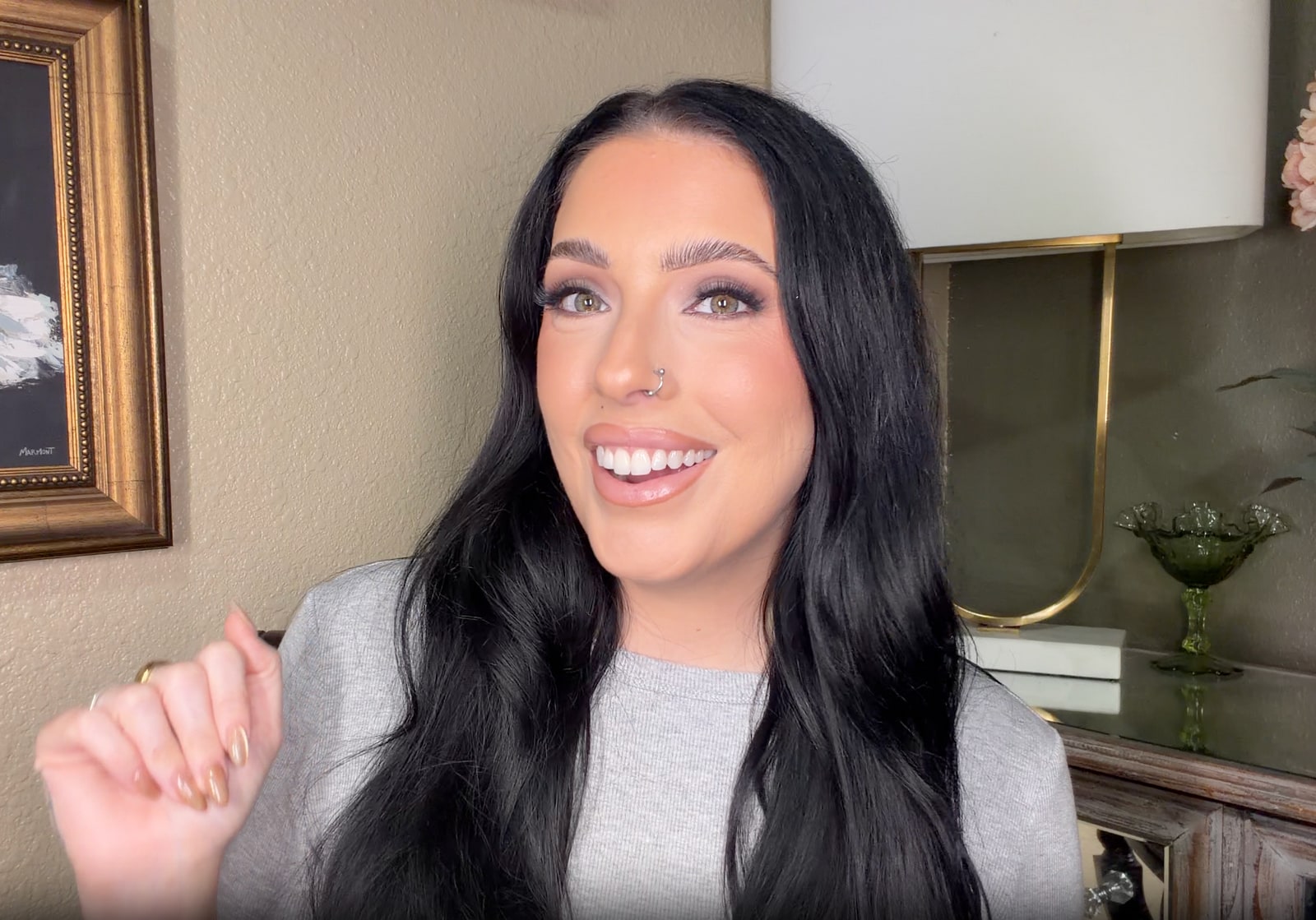 Creator Angelina P in a Hyax home-page testimonial video still
