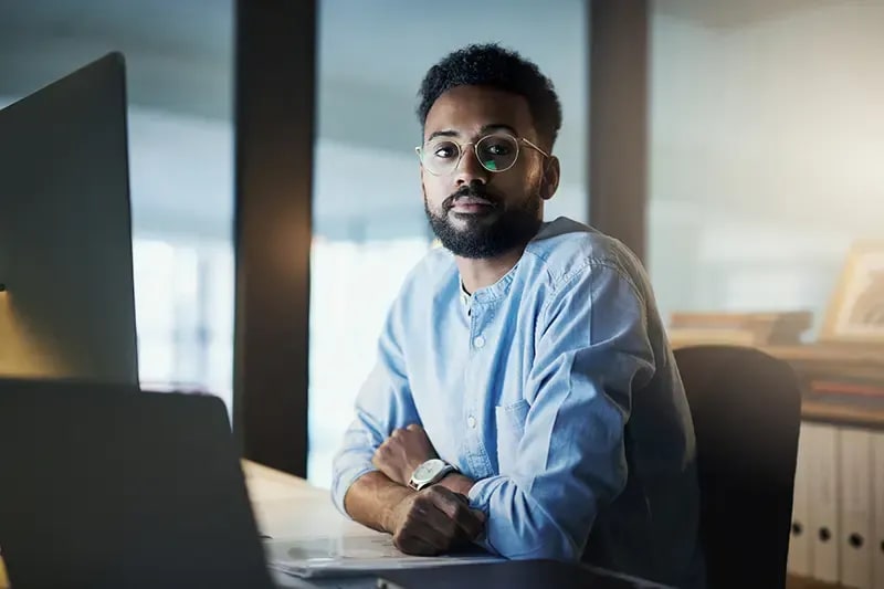 Engineer at a desk, from Liquid Web managed hosting pages