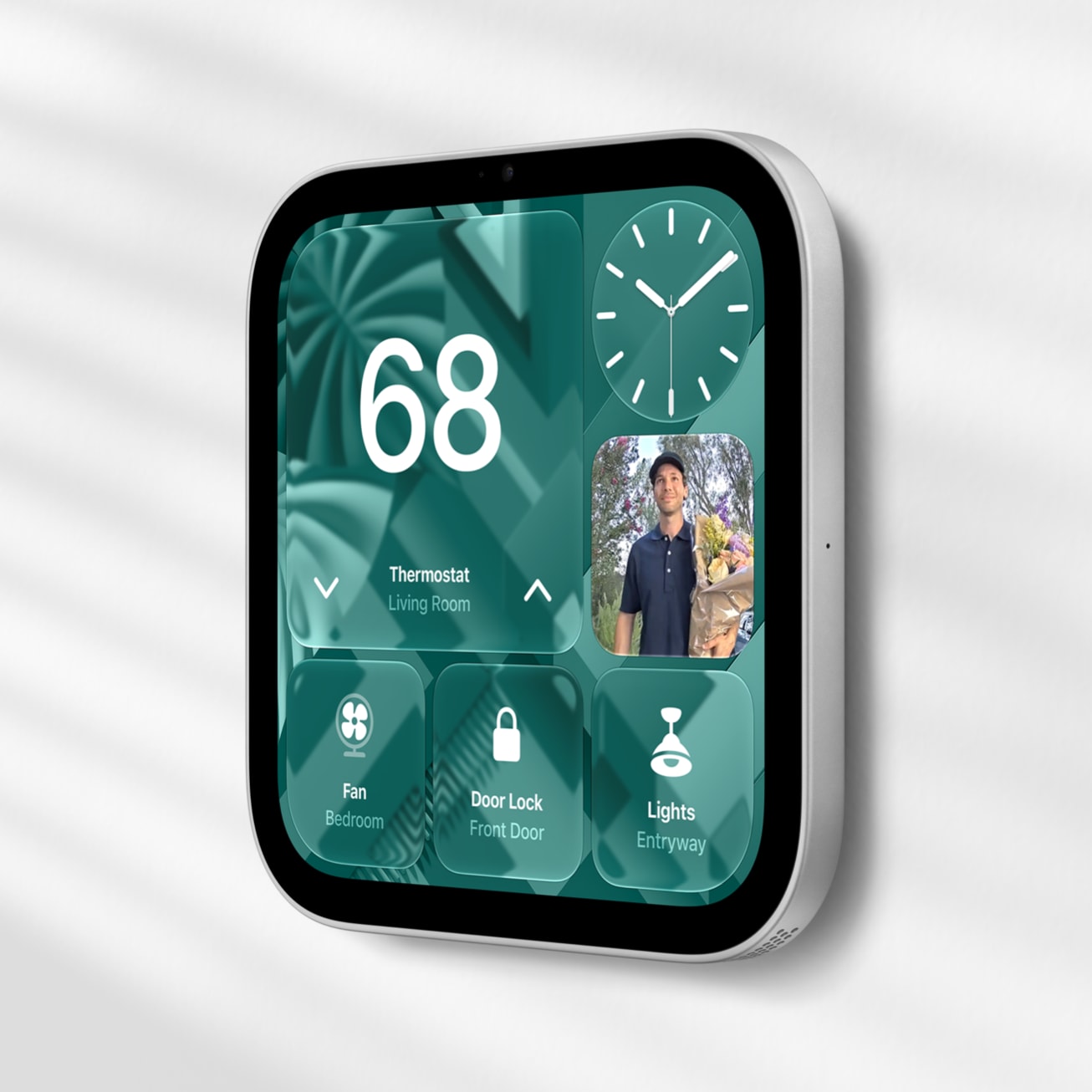 The wall-mounted Apple HomeView on a Schneider Home Power Mount