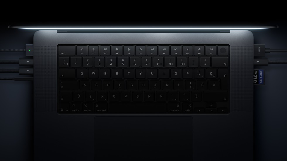 MacBook Pro keyboard and side ports including Thunderbolt 5, HDMI, SDXC and MagSafe