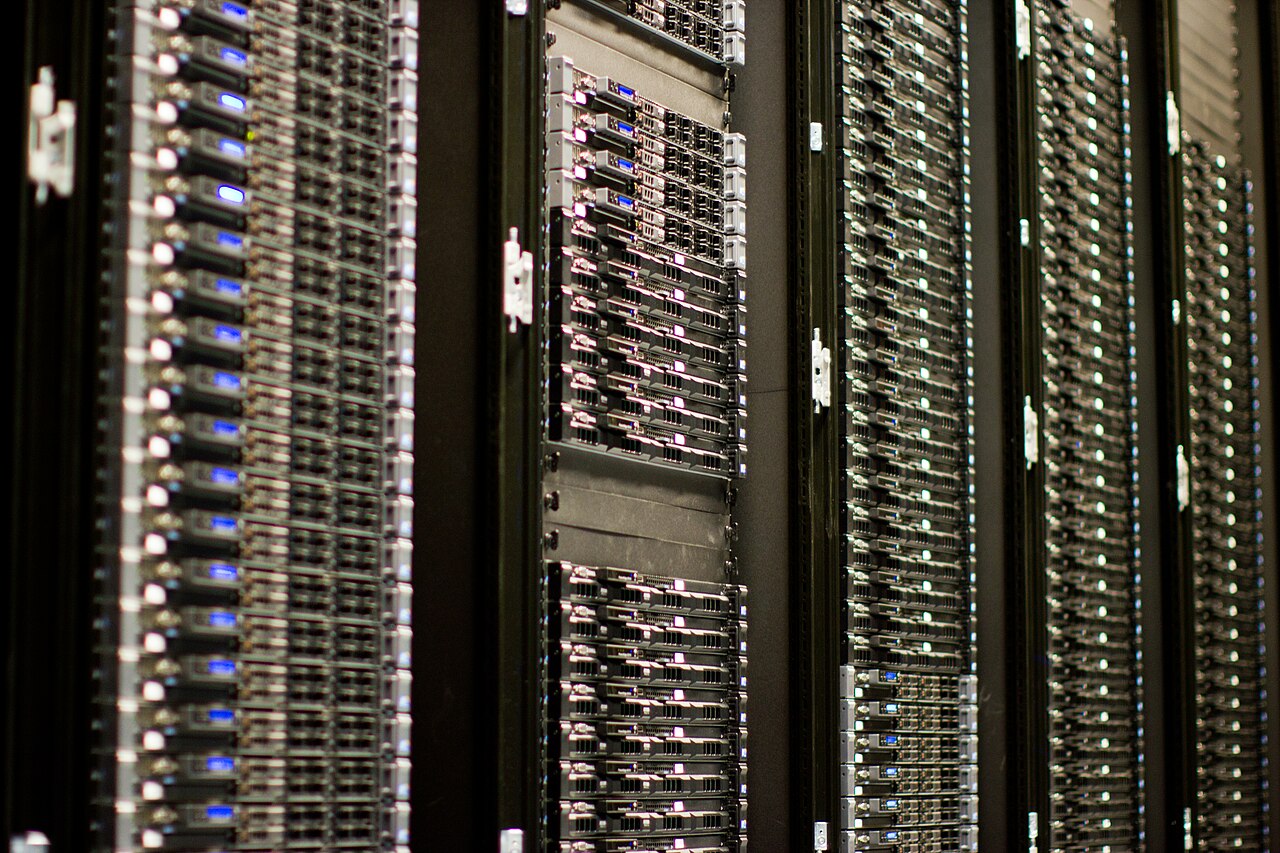 A data center hall full of servers, illustrating the scale of infrastructure sitting behind enterprise VPN gateways