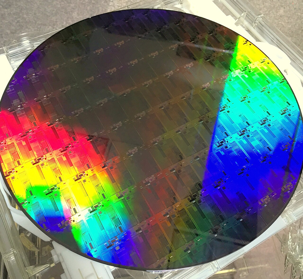 A 300mm silicon wafer patterned with hundreds of individual chips